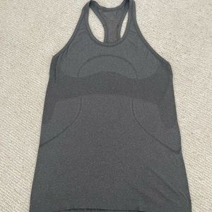 Lululemon razor back top. Silver imbedded. Gently worn